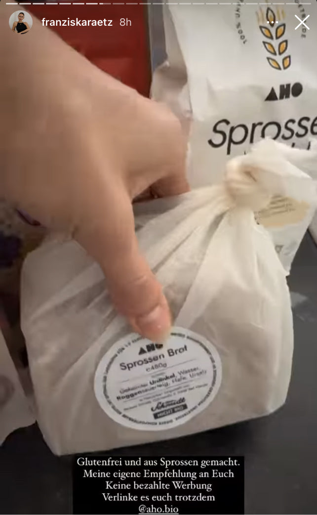 UGC AHO Sprossen Brot Verpackung in Hand Mehl